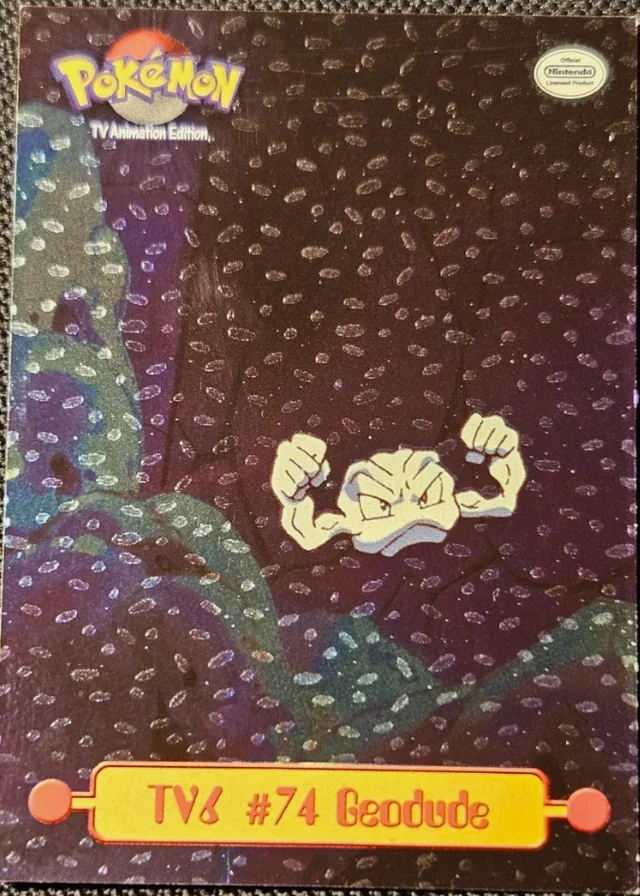 Geodude #TV6 4th Print - Black Logo · Dents Silver Foil – 1999 Topps Pokemon TV Animation Series 1 Pokémon card